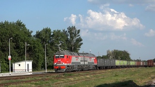 Тепловоз 2ТЭ25КМ-0268 с грузовым поездом
