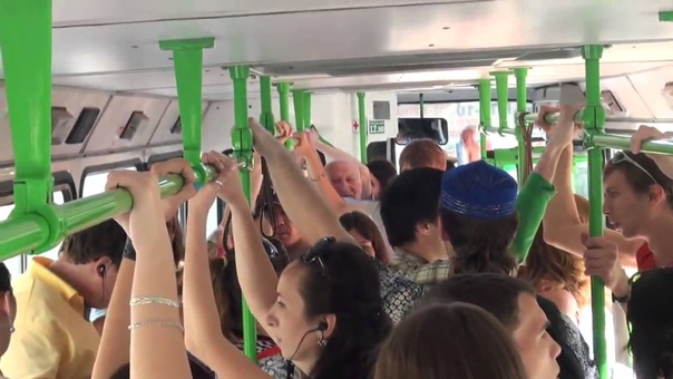 A Russian flashmob sings a Russian national song in a